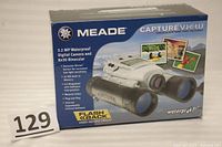 Meade CaptureView 3.2 MP Waterproof Digital Camera and 8x30 Binocular original retail box with print and product image.