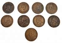 Nine Canadian one cent coins lined up on a surface, various dates visible including 1900 to 1918.