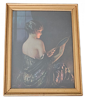 Framed print of an Art Deco style girl, showing back view as she looks into a mirror. The frame is golden wood tone.