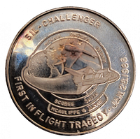 Obverse side of silver coin showing shuttle orbiting Earth with Challenger crew names and tragedy date.