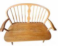 Top view showing curved wooden seat and vertical spindle backrest with armrests.