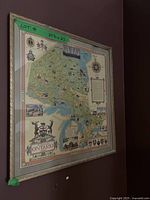 Full view of the framed map of Ontario from 1950 showing the entire map with borders and frame.