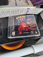 Photo of Crash Bandicoot 2: Cortex Strikes Back PlayStation 1 game jewel case with cover art showing.