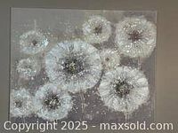 Canvas artwork depicting white and beige dandelion clocks on taupe background in an abstract style.