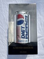 Front view of the clear acrylic display block enclosing a Diet Pepsi can showing retro branding and limited edition numbering 050/2000.