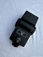 Front view of Vivitar SB-4 photoflash showing logo and auto thyristor button