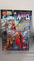 Front view of the packaged Bill Maus Nira Cyber Action Figure showing character artwork and toy in plastic bubble.