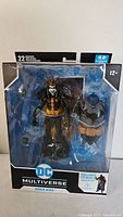 Front view of new-in-package DC Multiverse Robin King figure showing figure and included large companion accessory in blister pack.
