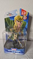 Front view of new in box Disney Infinity Marvel Super Heroes Loki figure, 2.0 Edition, showing packaging and figure details.