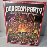 Front view of Dungeon Party board game box, sealed, showing illustrated fantasy artwork and title.