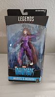 Front view of boxed Marvel Legends Series Inhumans Medusa action figure showing full figure and packaging.