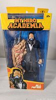 Front view of the All For One action figure in unopened box showing full figure with mutated arm and gas mask in My Hero Academia packaging