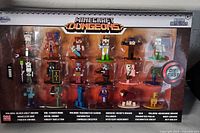 Front of boxed Minecraft Dungeons Nano Metalfigs Series 7 playset with all figures displayed