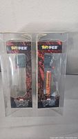 Two new Marvel Venom PEZ candy dispensers in sealed packaging, displayed side by side.