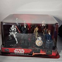 Front view of unopened Star Wars deluxe figurine play set box showing all character figurines.