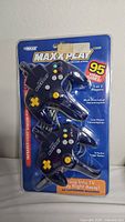 Front view of sealed original packaging containing two navy blue infrared light sensor controllers for V8 Maxx Max X Play video game system with 95 built-in games
