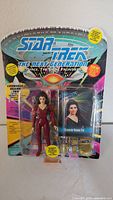 Front view of the new in package vintage Star Trek The Next Generation Counselor Deanna Troi action figure including blister pack and original box.