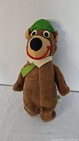 Front view of Yogi Bear plush showing character details and condition.