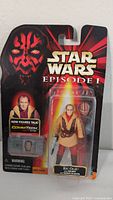 Photo of Star Wars Episode I Ric Olie action figure new in sealed package showing front of packaging with character image and accessories