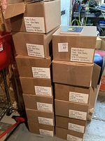 Stack of cardboard boxes each labeled with "Tally Dufour, Title: Star Baby, ISBN 9781777680200, Quantity 48 Books" showing total quantity over 600 books