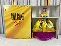 Limited Edition Bill Blass Barbie in original box showing the front of the box and doll inside.