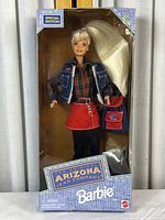 Full front view of the Original Arizona Jean Company Barbie Doll in original packaging showing the doll and most accessories in place.