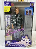 Full front view of the Harvey Kinkle action figure by Kenner in original packaging with visible box damage.