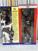 Photo of the front of the Starting Lineup Shawn Kemp collectible figure in original packaging showing the figure, the box with aging damage and player stats and images.