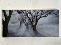 Front view of the atmospheric forest oil painting showing bare trees and mist in muted grays on a 12x24 canvas.
