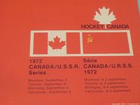 Front cover of booklet showing Canadian and USSR flags with Hockey Canada logo and series details in English and French