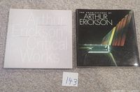 Two hardcover books with the titles 'Arthur Erickson Critical Works' and 'The Architecture of Arthur Erickson' shown on a carpeted floor.
