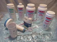 All hot tub water treatment chemicals displayed with included accessories