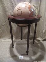 Full view of 16" globe and tripod stand showing overall appearance