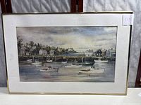 Full view of original framed watercolor painting showing harbor scene with boats and houses.