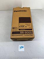 Original cardboard box of Panasonic RR-900D Microcassette Transcriber showing front with model and branding.