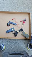All electrical testing items laid out in tray