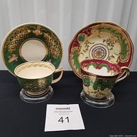 Both cup and saucer sets front view