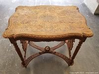 Top view showing carved scrollwork and shaped outline