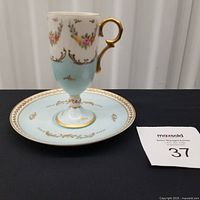 Cup on saucer showing overall design