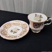 Cup and saucer side by side showing pattern and color