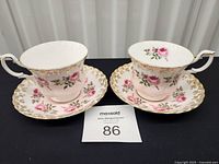 Front view of both teacup and saucer sets