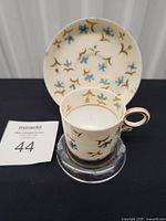 cup and saucer front view showing pattern and sizes