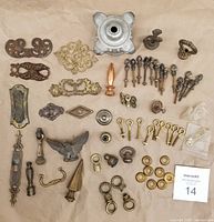 Full lot laid out showing all hardware pieces on paper background