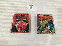 Front view of both comic books