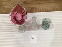 Three glass vases grouped together