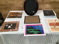All seven items displayed: five prints and two frames