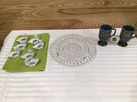 All items: 7 duck napkin rings, glass cake plate, 2 Irish Coffee mugs