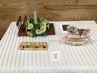 Overview of all items: wooden candle centerpiece, wine napkin pack, rocking horse, wine charms tray