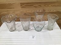 All four vases front view