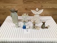 Group shot showing all seven angel figurines